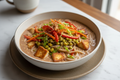 Sprouted ragi noodles in a coconut milk sauce with vegetables