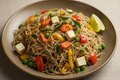 Sprouted jowar vermicelli tempered with mustard seeds, curry leaves and vegetables