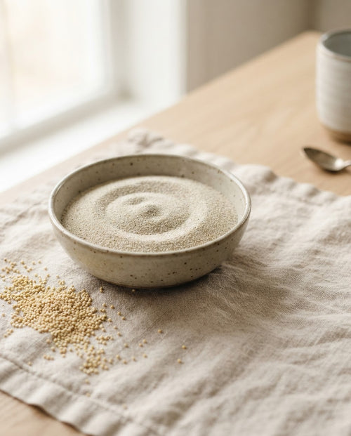Fine sprouted little millet rava in a ceramic bowl on linen